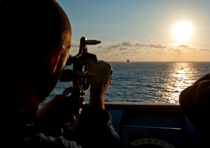 Flickr - Official U.S. Navy Imagery - An officer looks through a stadimeter.