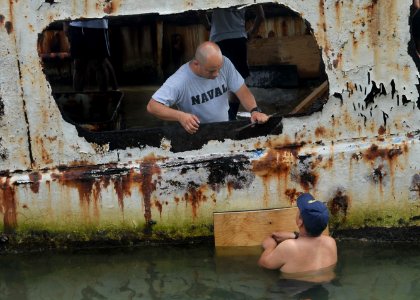 Flickr - Official U.S. Navy Imagery - Guatemalan divers place a patch on SS Misaray during a training salvage mission.