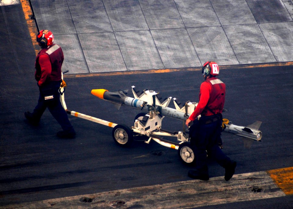 Flickr - Official U.S. Navy Imagery - Aviation ordnancemen move ordnance across the flight deck.