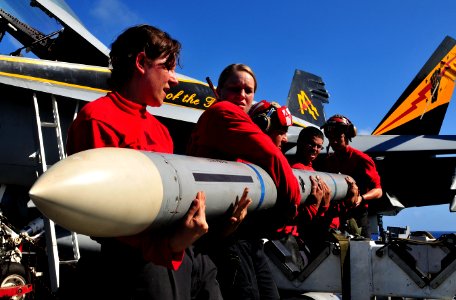 Flickr - Official U.S. Navy Imagery - Aviation ordnancemen move ordnance.