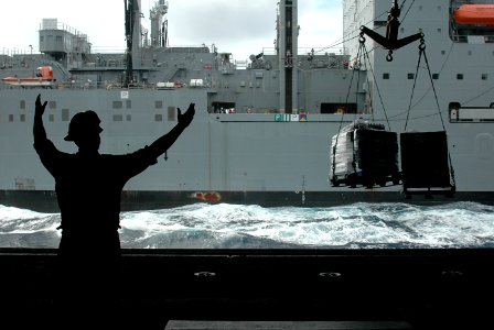 Flickr - Official U.S. Navy Imagery - Boatswain's Mate 3rd Class Donte Ruffin signals.