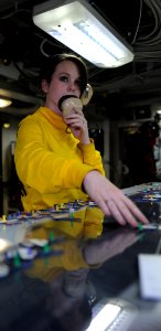 Flickr - Official U.S. Navy Imagery - Calif. native-Sailor moves an aircraft template on the Ouija board in flight deck control aboard USS John C. Stennis