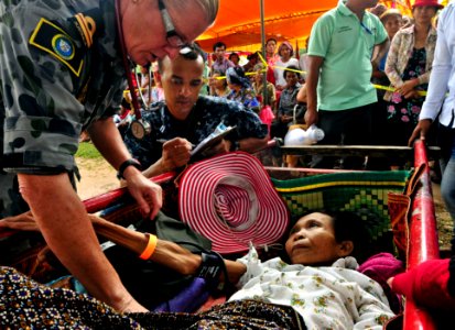 Flickr - Official U.S. Navy Imagery - An officer examines the blood pressure of a Cambodian woman.