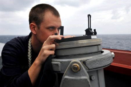 Flickr - Official U.S. Navy Imagery - An officer takes a bearing at sea.