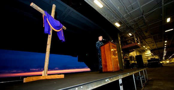 Flickr - Official U.S. Navy Imagery - Chaplain Lt. Cmdr. Robert Wills gives the pastoral welcome during Easter Sunrise Service.