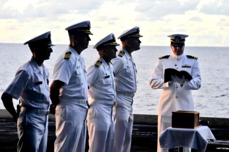 Flickr - Official U.S. Navy Imagery - Chaplain reads eulogy at burial at sea.