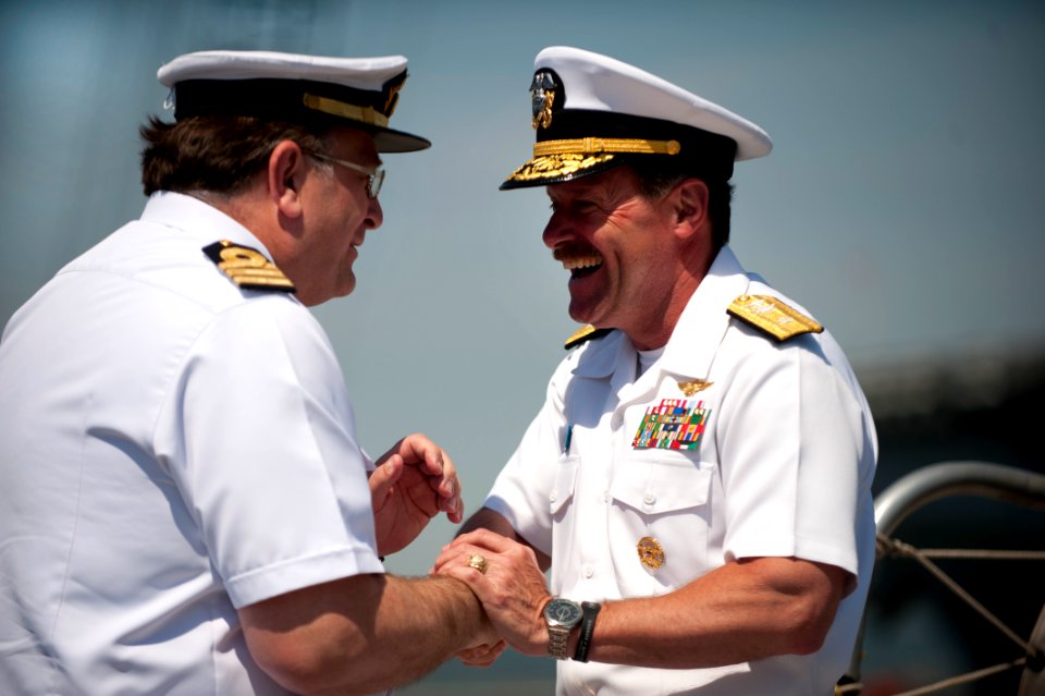Flickr - Official U.S. Navy Imagery - Cmdr. Juan Escrigas, left, welcomes aboard Rear Adm. Michael C. Manazir.
