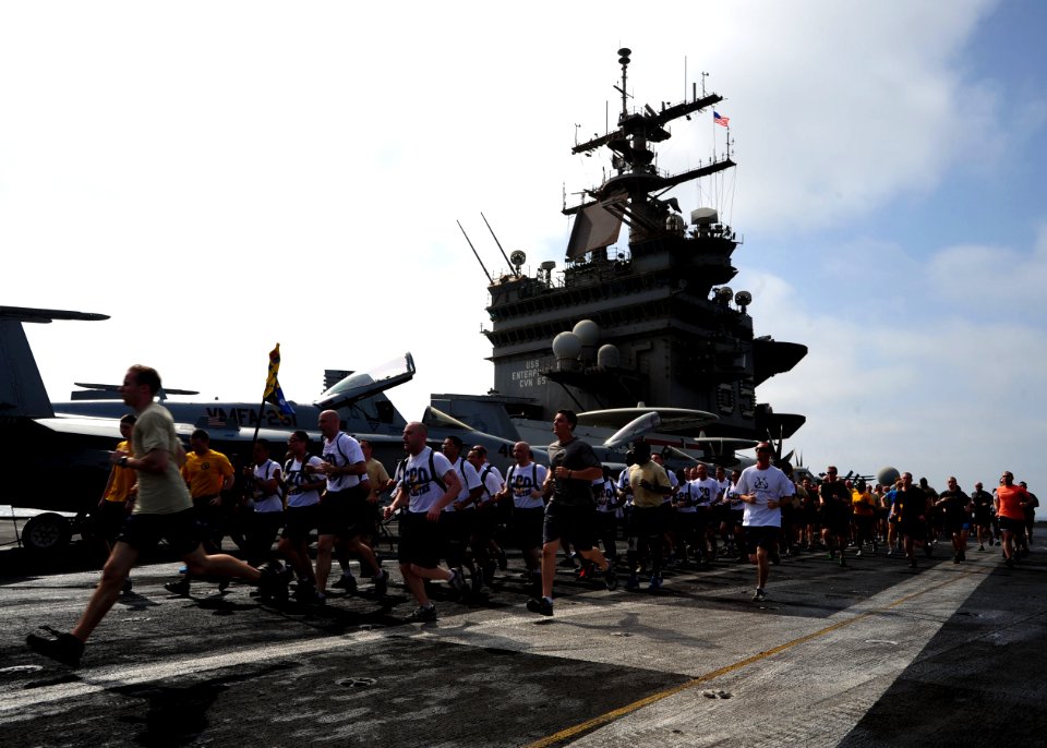 Flickr - Official U.S. Navy Imagery - Chief petty officer selectees run in formation during a 5K run.