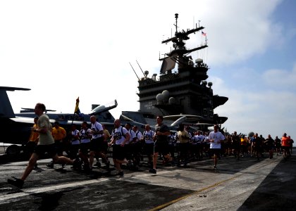 Flickr - Official U.S. Navy Imagery - Chief petty officer selectees run in formation during a 5K run.