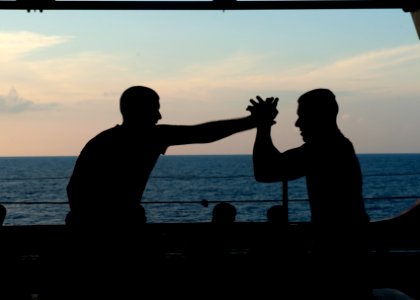 Flickr - Official U.S. Navy Imagery - Marines practice self-defense tactics in the hangar bay of USS Makin Island.