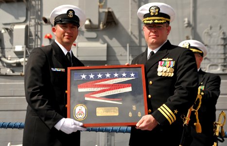 Flickr - Official U.S. Navy Imagery - Cmdr. Richard Meyer receives the command pendant of USS John L. Hall.