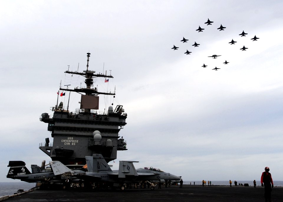 Flickr - Official U.S. Navy Imagery - CVW 1 aircraft fly above USS Enterprise.