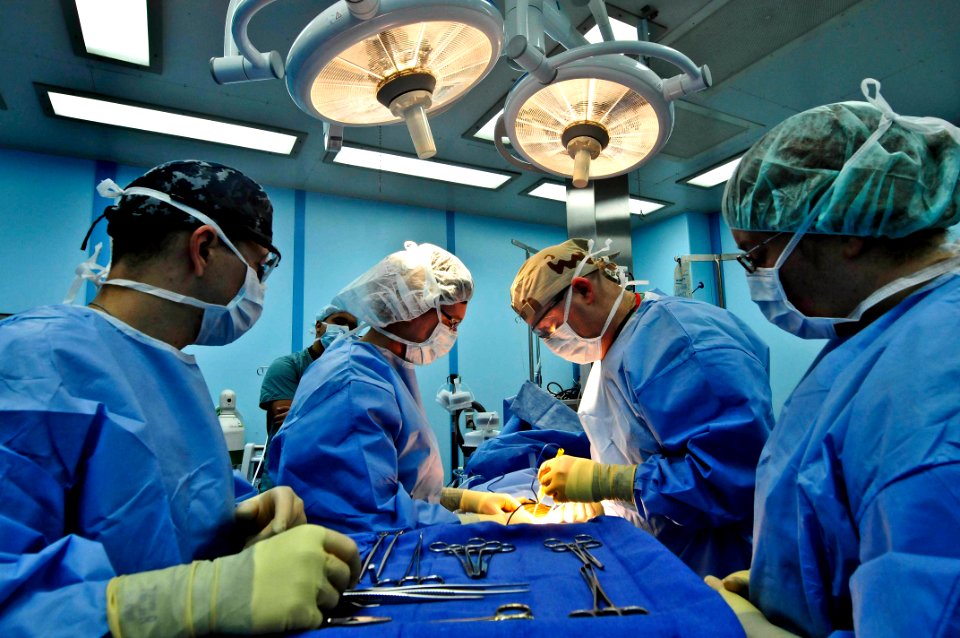 Flickr - Official U.S. Navy Imagery - Doctors perform surgery together.