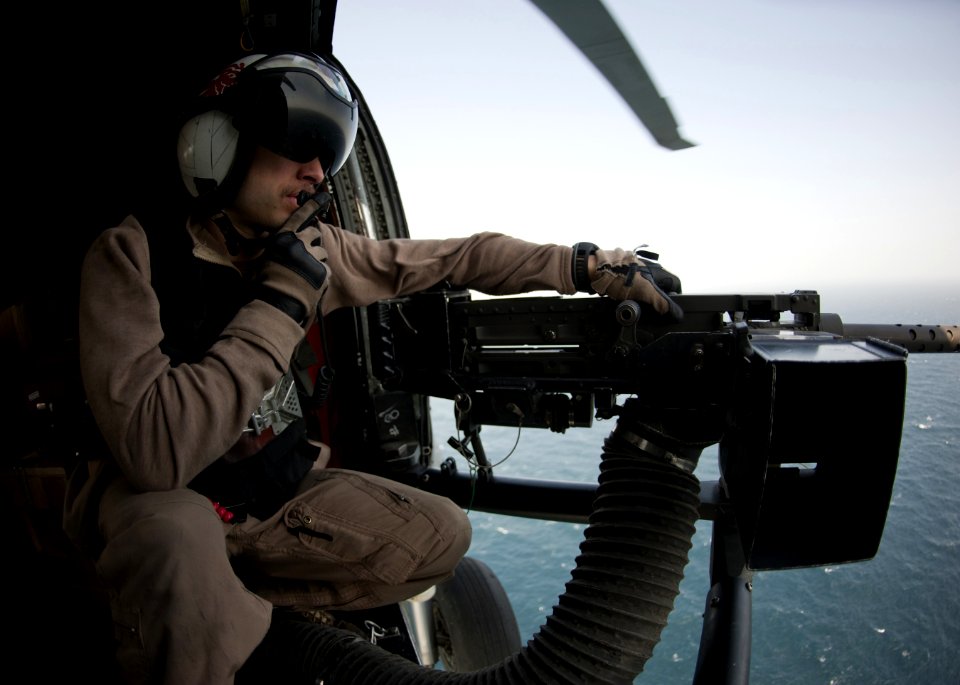 Flickr - Official U.S. Navy Imagery - Naval Air Crewman Airman Terry Warren mans a .50 caliber machine gun.
