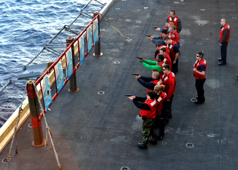 Flickr - Official U.S. Navy Imagery - Enterprise Sailors take part in pistol qualifications.