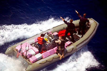 Flickr - Official U.S. Navy Imagery - Navy and Coast Guard personnel pick up bales of narcotics during recovery operations in the Caribbean Sea. (3)