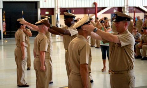 Flickr - Official U.S. Navy Imagery - New chiefs receive their combination covers.