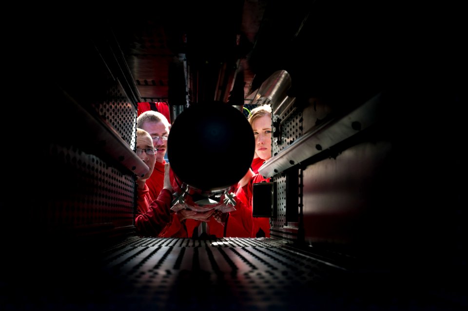 Flickr - Official U.S. Navy Imagery - Fire controlmen load a NATO sea sparrow missile.