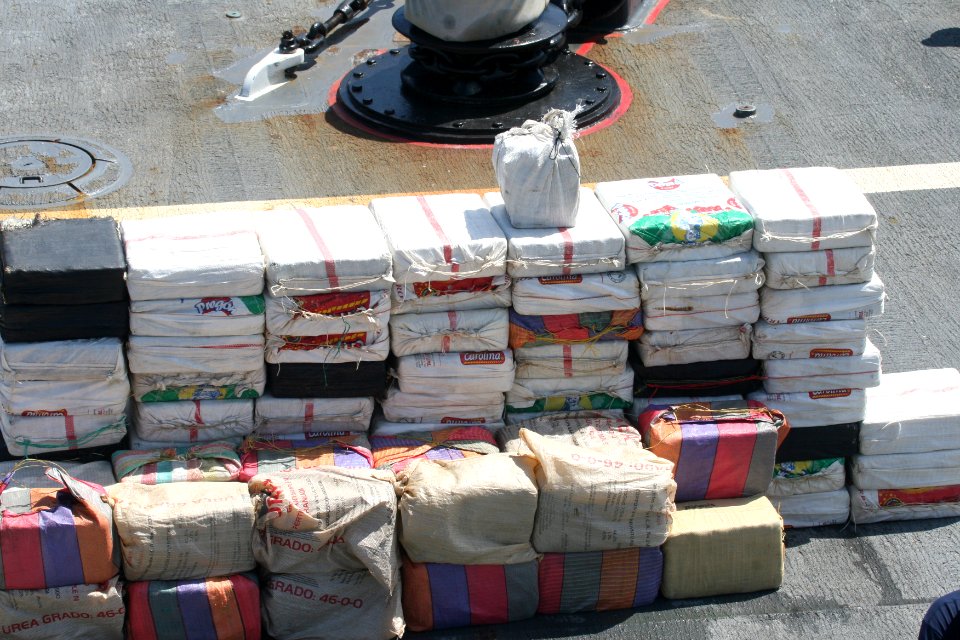 Flickr - Official U.S. Navy Imagery - One hundred and twelve bales of cocaine recovered from a drug interdiction are offloaded onto the deck of USS Nicholas