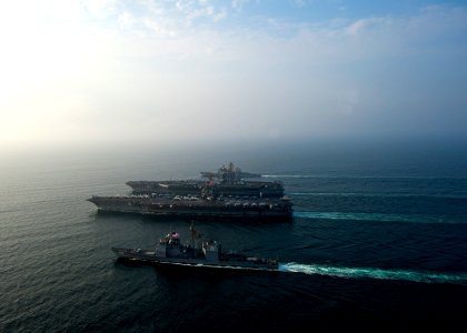 Flickr - Official U.S. Navy Imagery - Four Navy ships at sea.