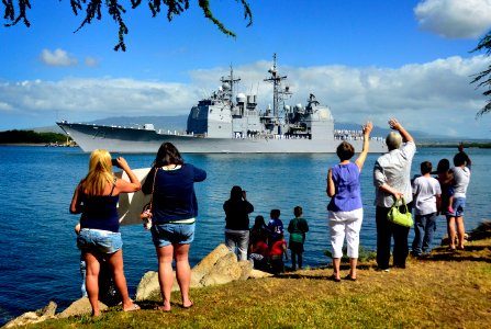 Flickr - Official U.S. Navy Imagery - Friends and family members of USS Port Royal Sailors wave as the ship departs Joint Base Pearl Harbor-Hickam for a deployment