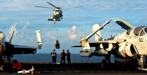 Flickr - Official U.S. Navy Imagery - Helicopter delivers supplies at sea.