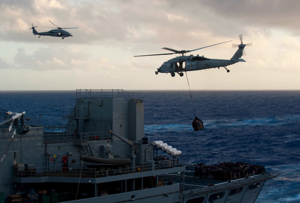 Flickr - Official U.S. Navy Imagery - Helicopter transports pallets of supplies.