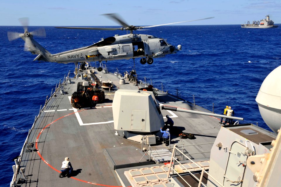 Flickr - Official U.S. Navy Imagery - Helicopter picks up supplies from ship.