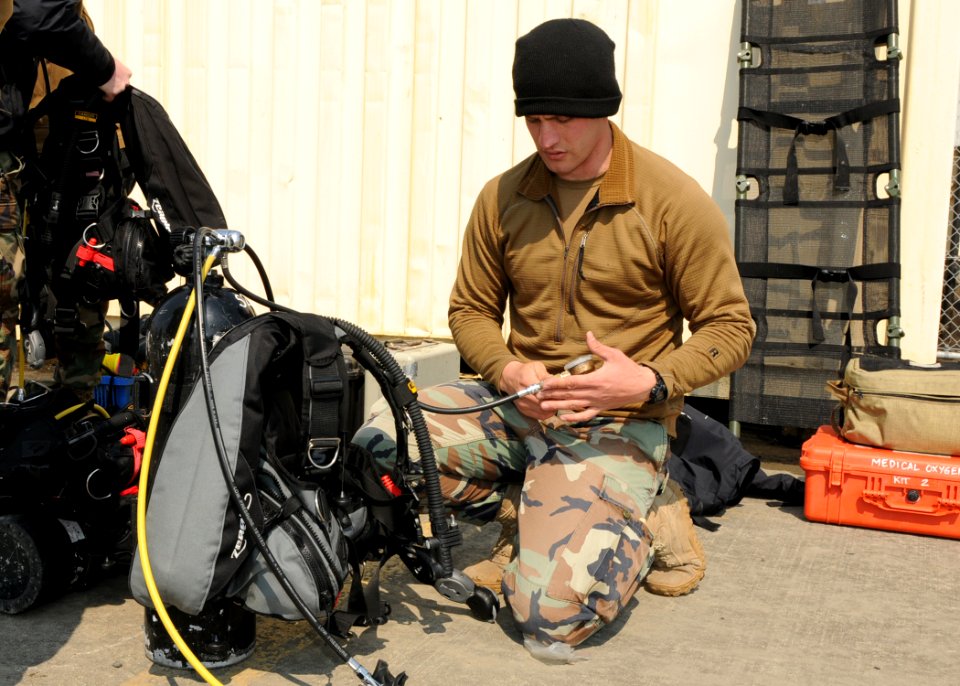 Flickr - Official U.S. Navy Imagery - Sailor checks equipment before salvage operation in Japan.