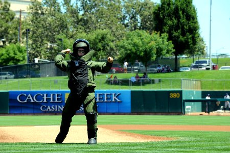 Flickr - Official U.S. Navy Imagery - Lt. j.g. Daniel Glenn throws out the first pitch. photo