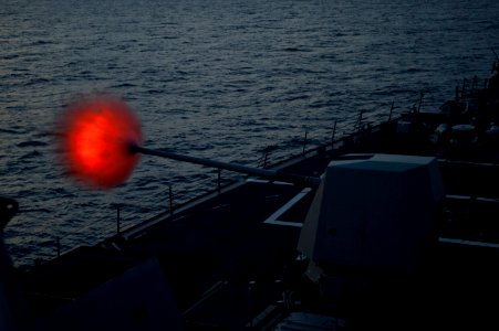 Flickr - Official U.S. Navy Imagery - Jason Dunham fires its 5-inch gun.