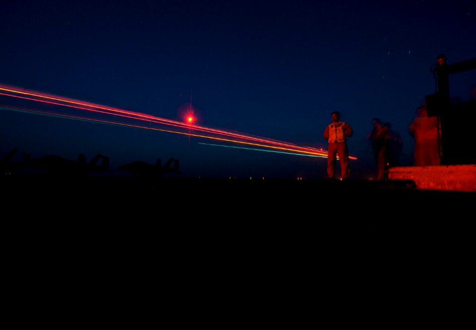 Flickr - Official U.S. Navy Imagery - Landing Signal Officers guide aircraft aboard USS Carl Vinson.