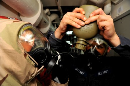 Flickr - Official U.S. Navy Imagery - Sailor gets a drink during a drill.