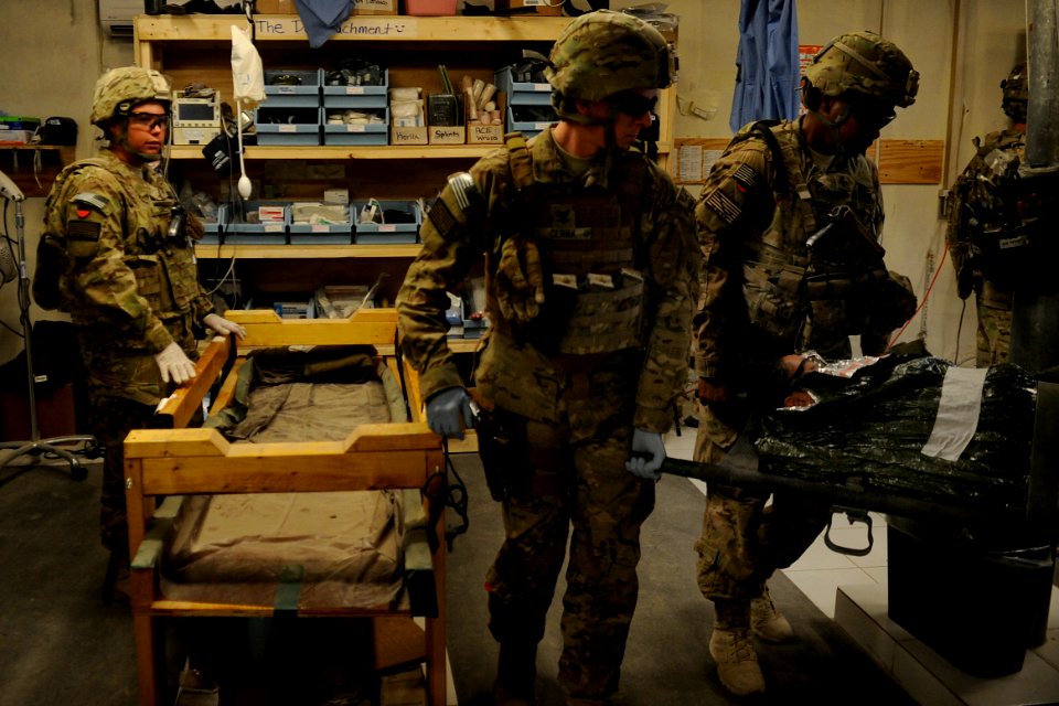 Flickr - Official U.S. Navy Imagery - Members of Kandahar Provincial Reconstruction Team treat simulated casualties.