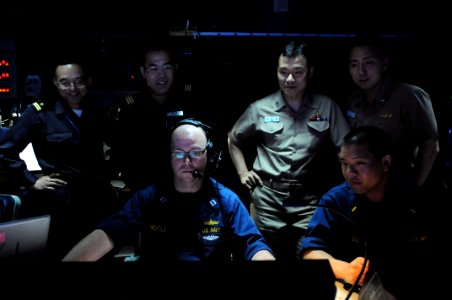 Flickr - Official U.S. Navy Imagery - Members from the Republic of Korea navy and the Japan Maritime Self Defense Force observe operations in the combat information center.