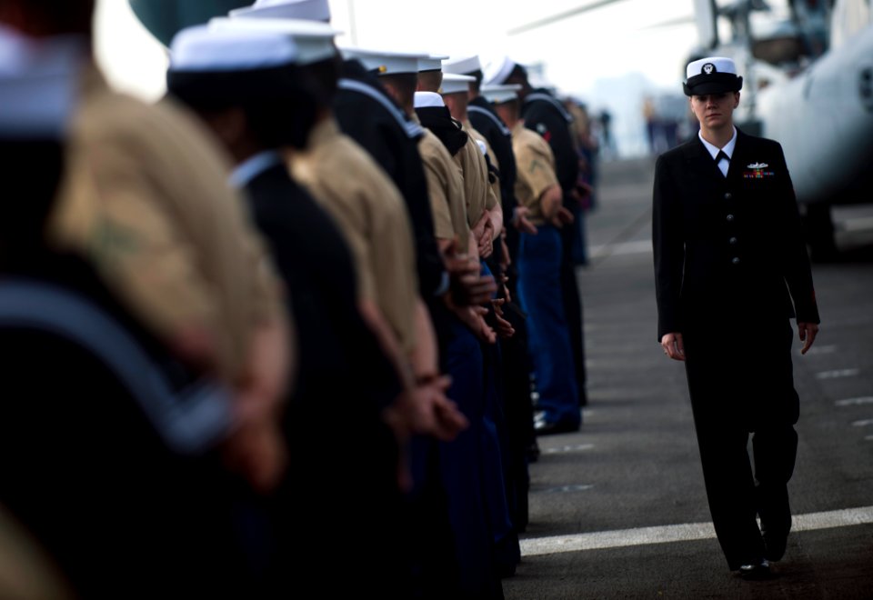 Flickr - Official U.S. Navy Imagery - Sailor observes manning the rails.