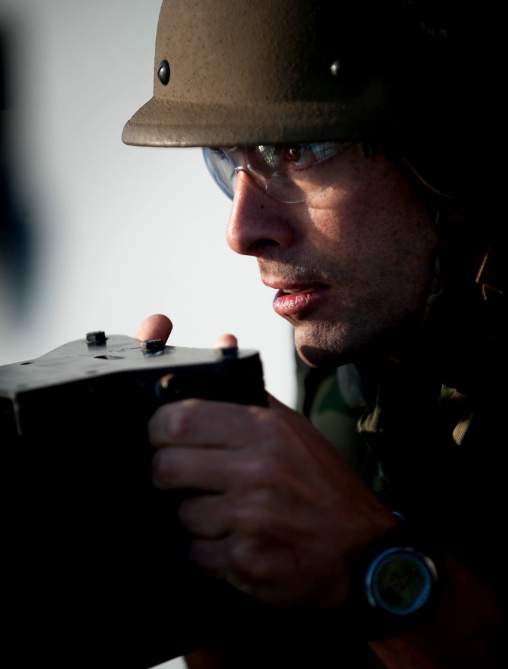 Flickr - Official U.S. Navy Imagery - Naval officer fires machine gun during exercise.
