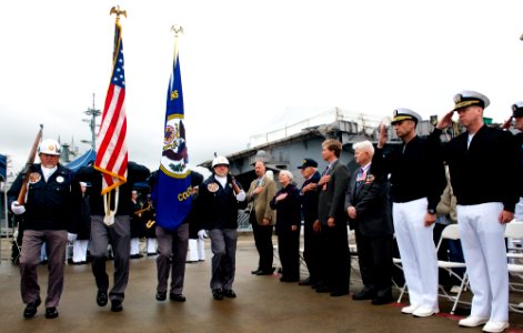 Flickr - Official U.S. Navy Imagery - Members of the Peninsula Honor and Color Guard team parade the colors during a Battle of Midway commemoration ceremony on a pier at Naval Base Kitsap.