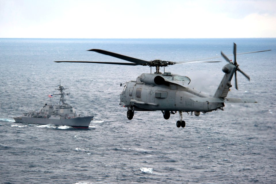Flickr - Official U.S. Navy Imagery - Navy Sea Hawk flies toward USS Stockdale.