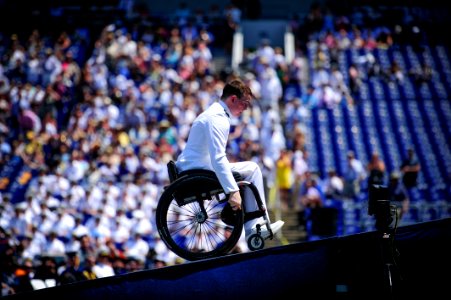 Flickr - Official U.S. Navy Imagery - Midshipman 1st Class Kevin Hillery makes his way on stage to receive his diploma during the 2012 graduation ceremony at the U.S. Naval Academy.