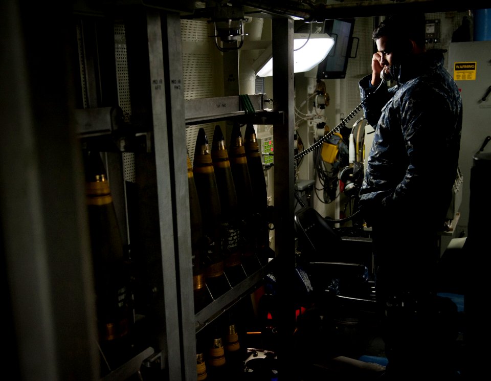 Flickr - Official U.S. Navy Imagery - Navy gunner's mate requests permission to load MK-45 gun.