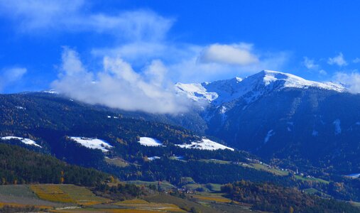 Snow clouds mountain landscape photo