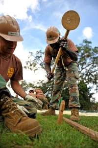 Flickr - Official U.S. Navy Imagery - Navy Seabees prepare stakes for the timed field tent assembly during the annual Seabee Rodeo