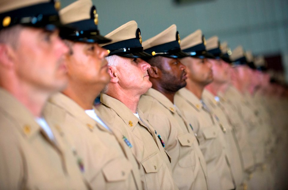 Flickr - Official U.S. Navy Imagery - New chiefs stand at attention after their pinning.