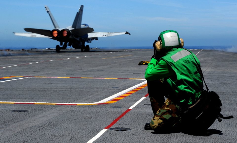 Flickr - Official U.S. Navy Imagery - New Yorker-Sailor photographs Super Hornet aboard USS John C. Stennis.