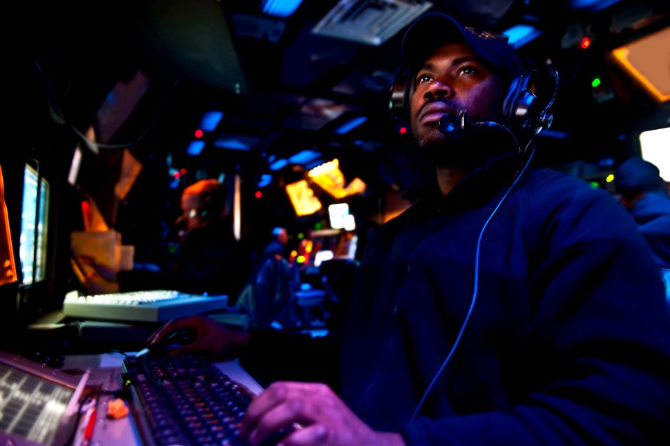 Flickr - Official U.S. Navy Imagery - Operations Specialist Seaman Andre Brown mans a console in the Combat Information Center of the Ticonderoga-class guided-missile cruiser USS Cape St. George.