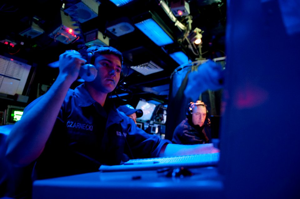 Flickr - Official U.S. Navy Imagery - Operations Specialist Seaman Jacob Czarnecki relays a message to the tactical action officer aboard the Ticonderoga-class guided-missile cruiser USS Cape St. George.