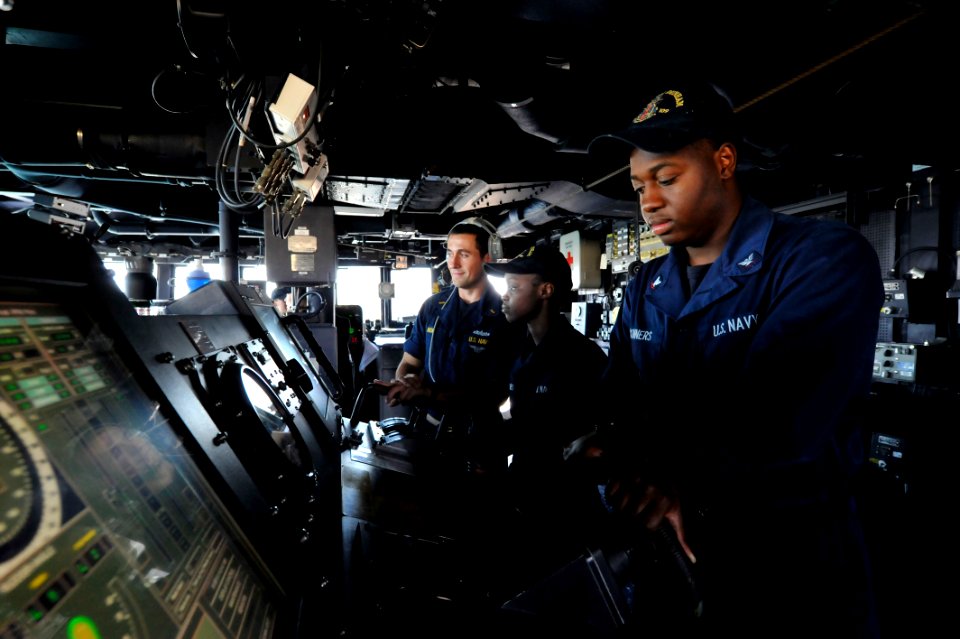 Flickr - Official U.S. Navy Imagery - Sailor at the helm of USS Jason Dunham.