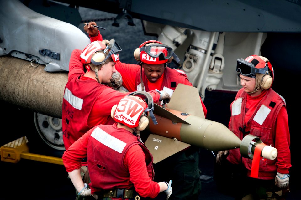 Flickr - Official U.S. Navy Imagery - Sailors arm a GBU-16 Paveway II.