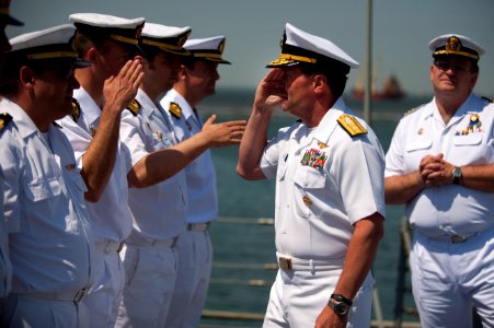 Flickr - Official U.S. Navy Imagery - Rear Adm. Michael C. Manazir salutes while reviewing Spanish navy sailors.